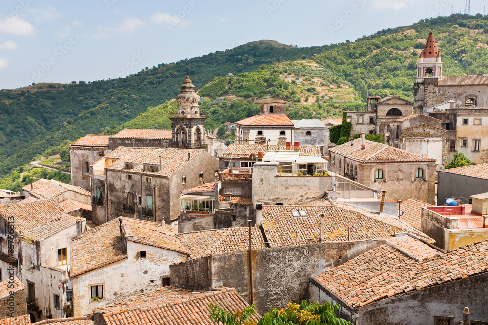 view on ancient tile roofs and tower church