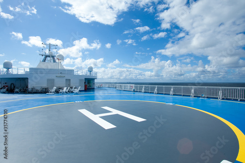 Ship, sea and sky with clouds - beautiful sunny landscape photo