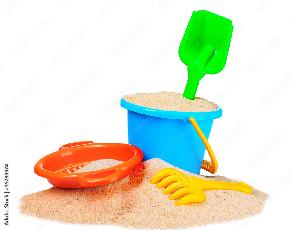 children's beach toys and sand isolated on white children's beach toys and sand isolated on white