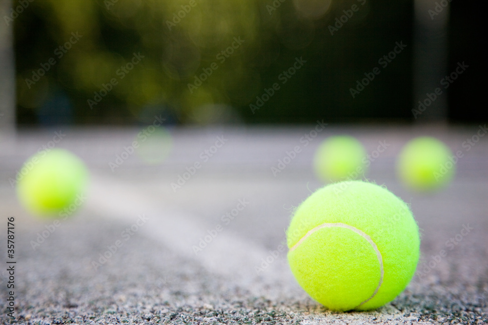 tennis ball on the court line