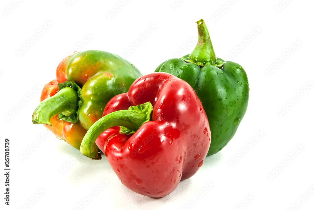 Three fresh sweet pepper shot on white background. Three fresh sweet pepper shot on white background.