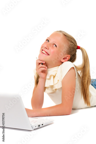 Little girl with laptop on white background