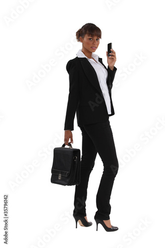 Woman with a phone and a briefcase