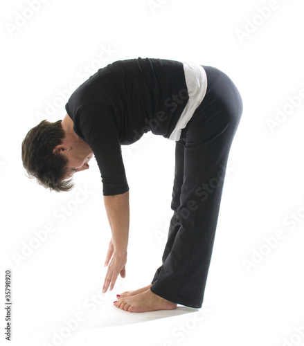 female yoga position toe touch hamstring stretch