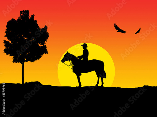 Cowboy enjoying the sunset