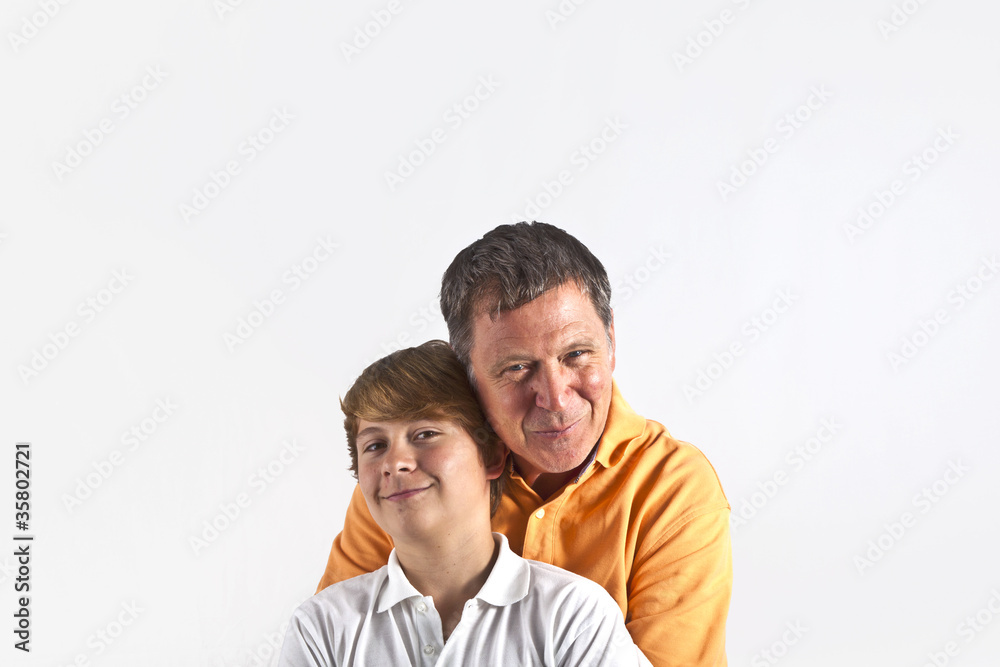 father and son hugging father and son hugging