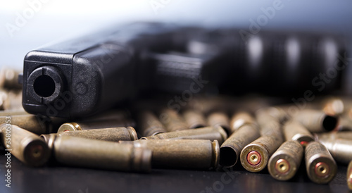 Ammunition and automatic handgun photo