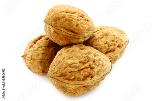 Walnuts close-up on a white background