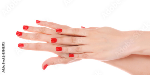 beautiful red manicure isolated on white
