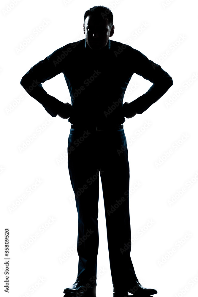 silhouette man full length angry hands on hips