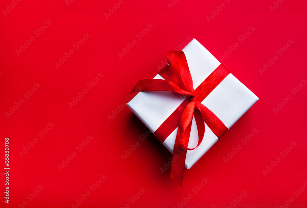 Small gift with red ribbon Small gift with red ribbon