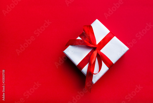 Small gift with red ribbon