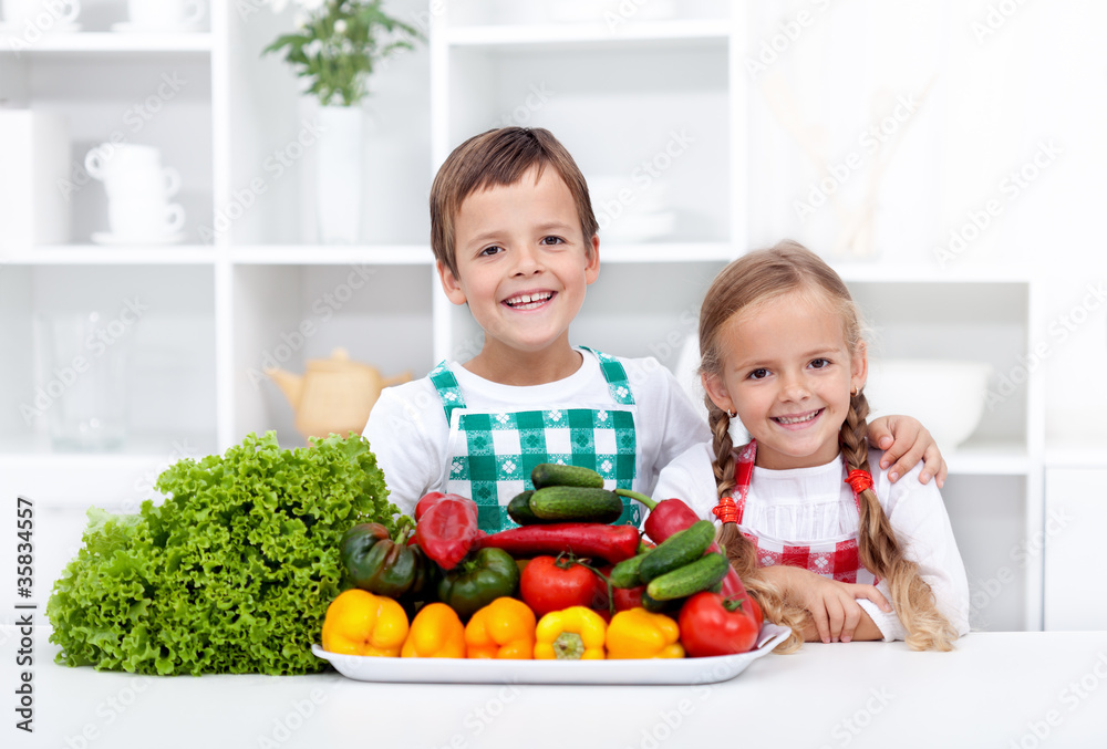 Happy healthy kids with vegetables