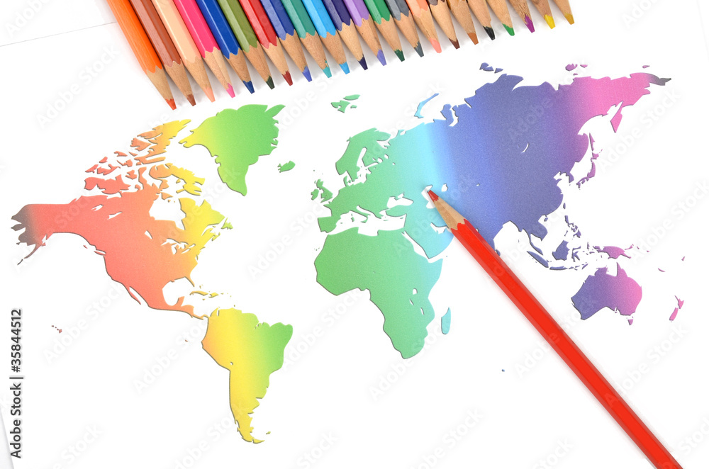 Obraz premium Color pencils and world map