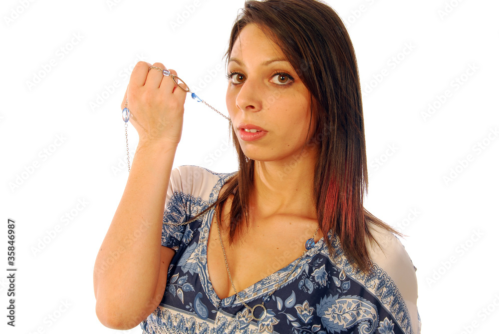 Beautiful sexy brunette playing with a necklace Beautiful sexy brunette playing with a necklace