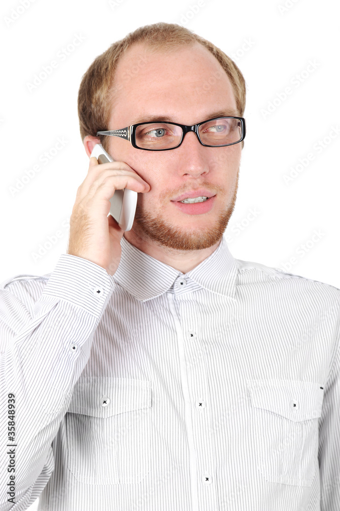 young businessman in white shirt and glasses speaking on mobile young businessman in white shirt and glasses speaking on mobile