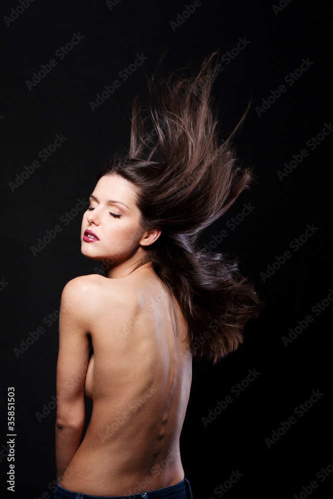 Beautiful brunette model in studio with magnificent hair Beautiful brunette model in studio with magnificent hair