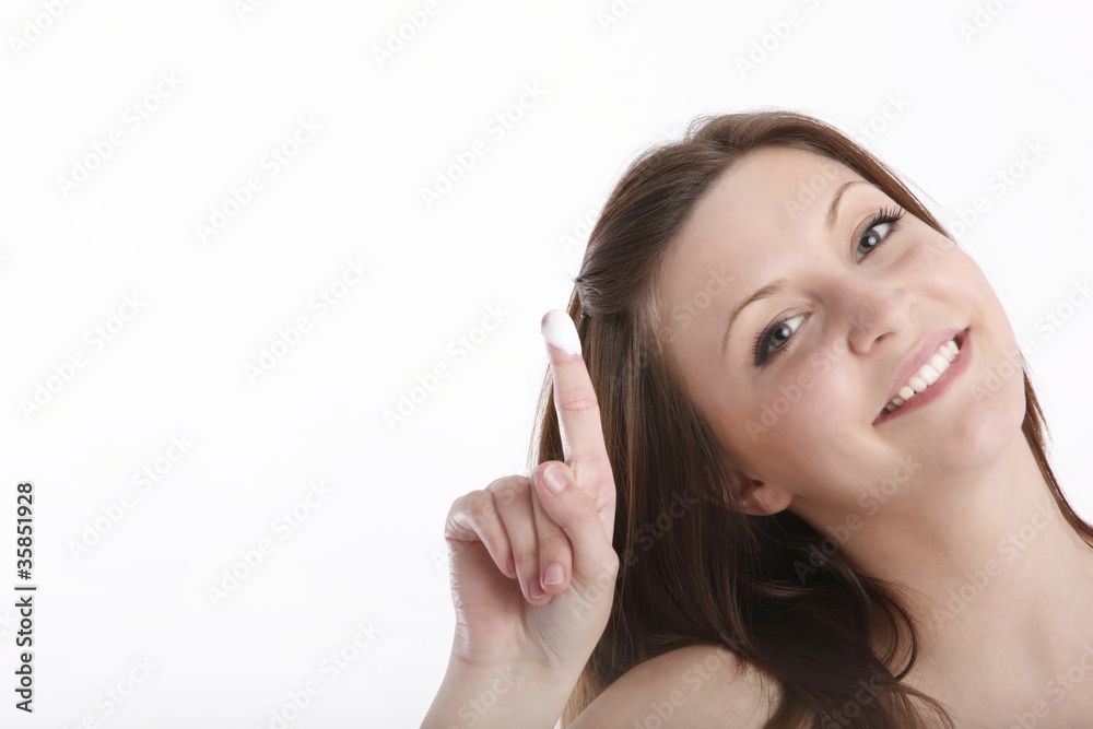 beautiful young woman with creme beautiful young woman with creme
