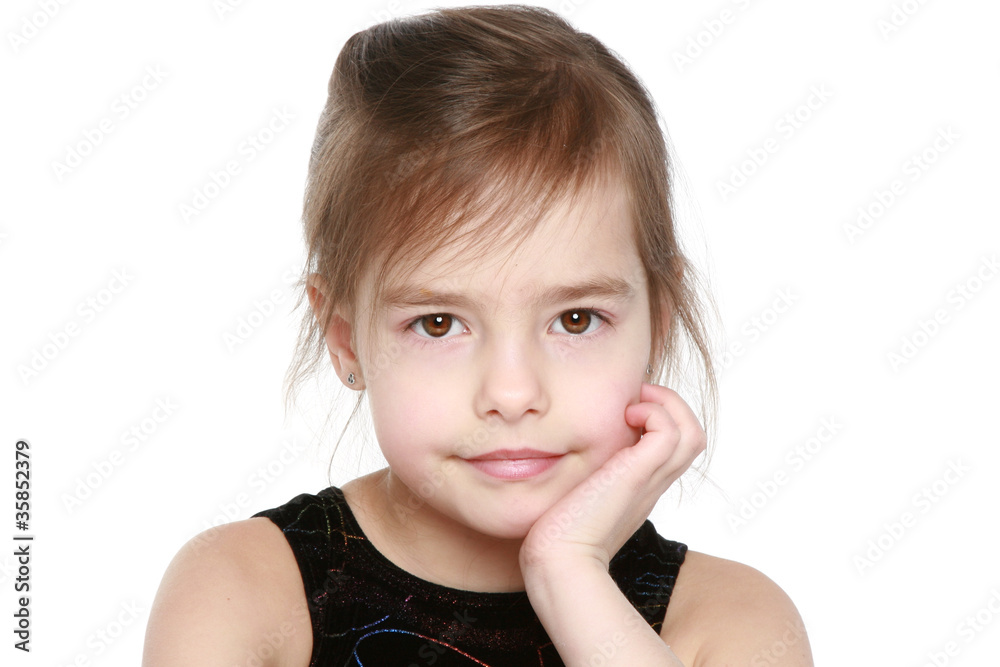 Adorable little girl on white background. Close-up portrait Adorable little girl on white background. Close-up portrait