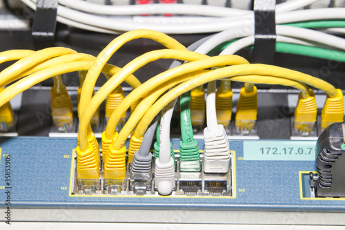 Yellow, white, green and gray network cables