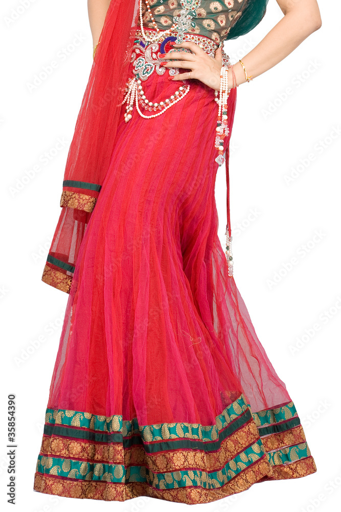 young woman draped in red color wedding saree,India