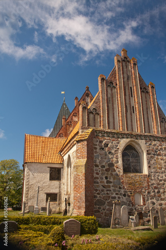 Kirche in Bobbin auf Rügen mit Grabsteinen photo