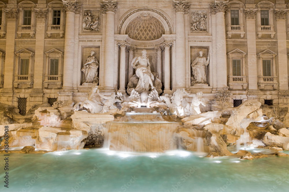 Famous Italy Rome landmark baroque fountain di trevi in twilight