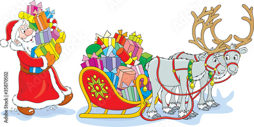Santa loads his sleigh with Christmas gifts
