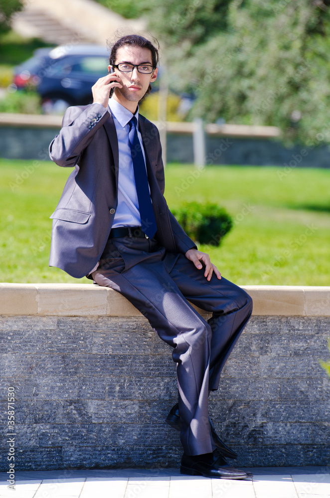 Young businessman at the street scene Young businessman at the street scene