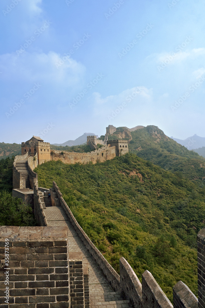 Great Wall of China Jinshaling traversing hills into distance
