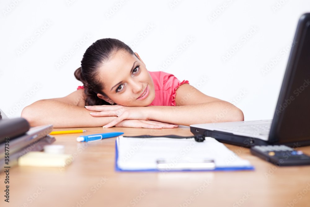 Portrait of relaxed young business woman smiling at office Portrait of relaxed young business woman smiling at office