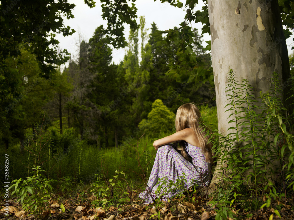 Beautiful young lady in the forest Beautiful young lady in the forest