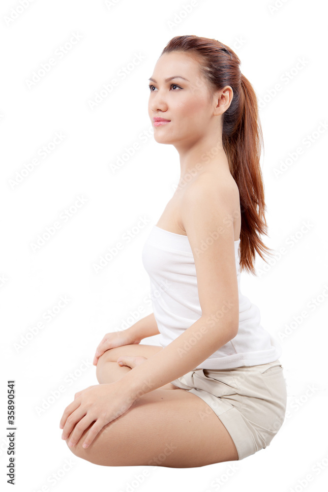 asian woman doing yoga with her eyes opened asian woman doing yoga with her eyes opened