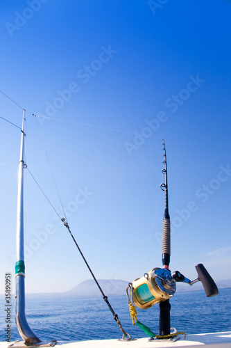 fishing boat trolling with outrigger gear