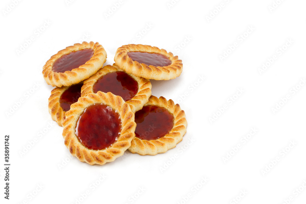 Cookies with fruit jam top isolated on white