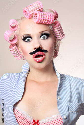 Attractive girl with a mustache
