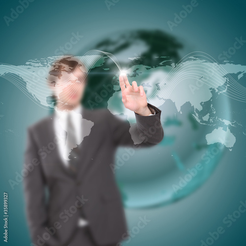 young man touches a virtual surface.