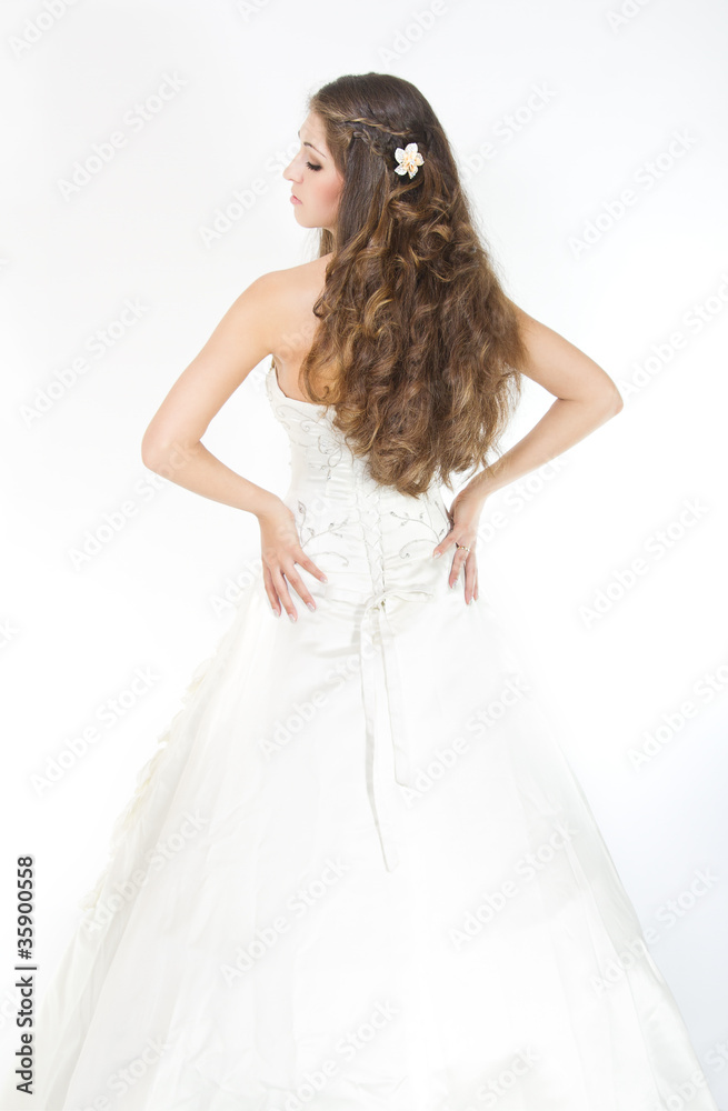 Long curly hair. Bride with hairstyle in wedding dress. Back vie Stock  Photo | Adobe Stock