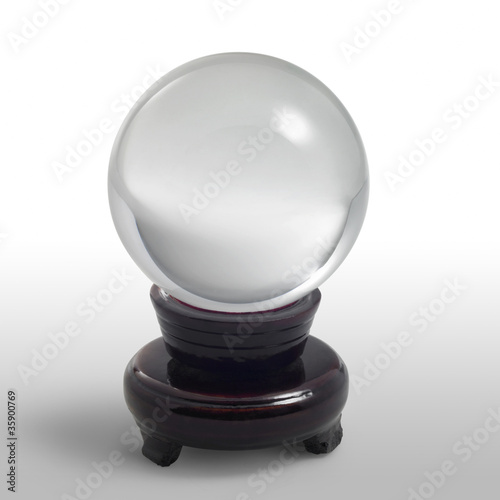 crystal ball on stand in light back