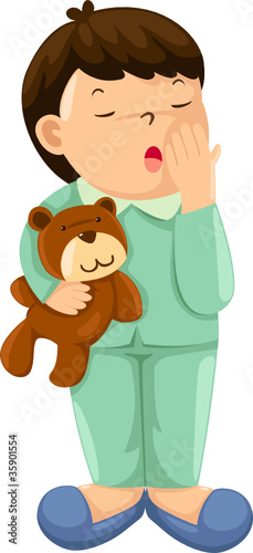 Sleepy boy with teddy bear