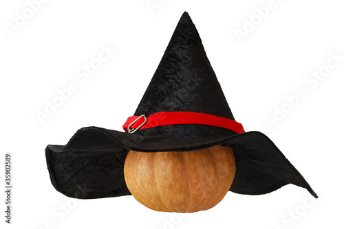 Small Halloween pumpkin in witch hat