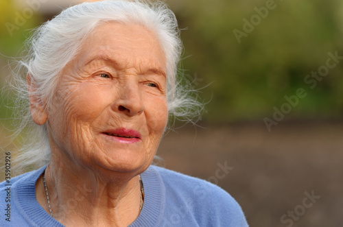 Portrait of the elderly woman
