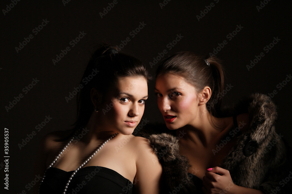 Two sexy girls posing Two sexy girls posing