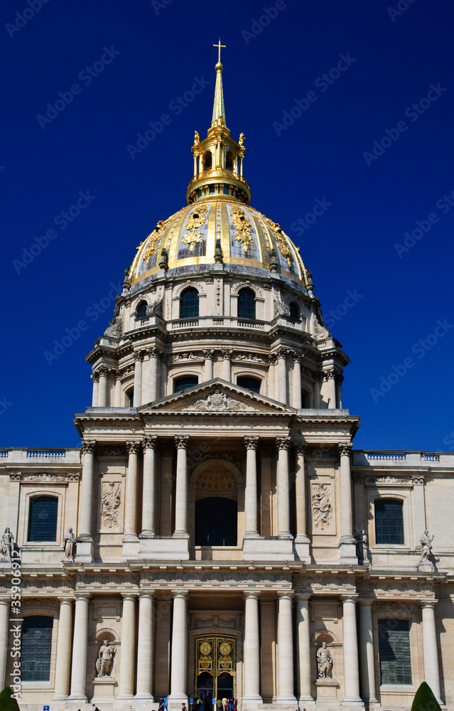 Invalides palace in Paris showing golden dome  in blue sky