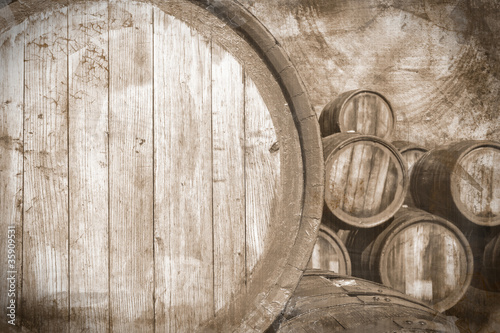 Old wine casks in vintage stile, background