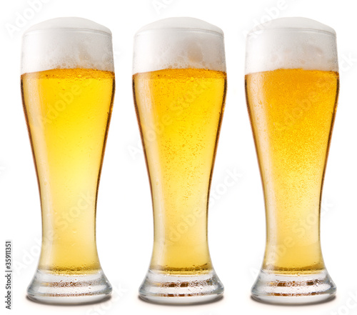 Obraz na płótnie Beer into glass isolated on white. three options w salonie