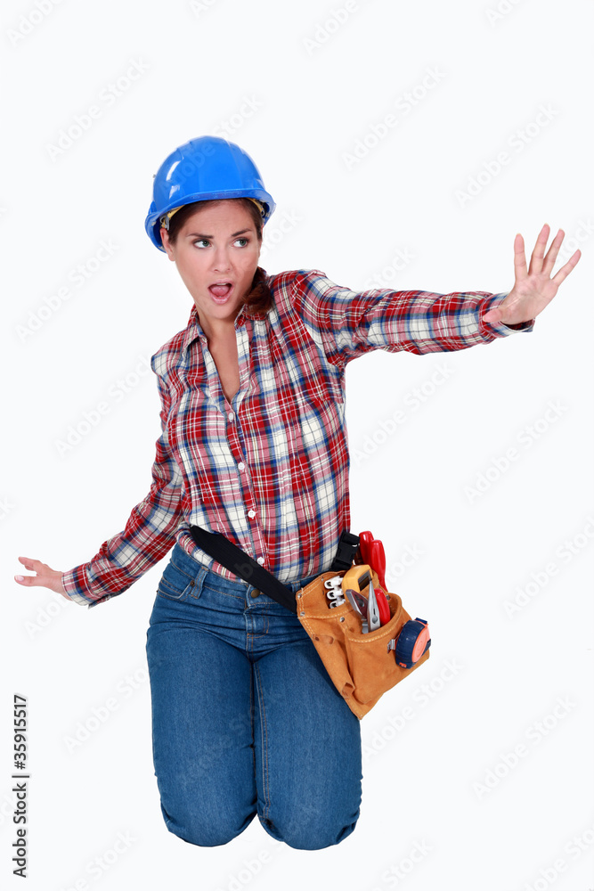Female laborer doing sign with her hand Female laborer doing sign with her hand