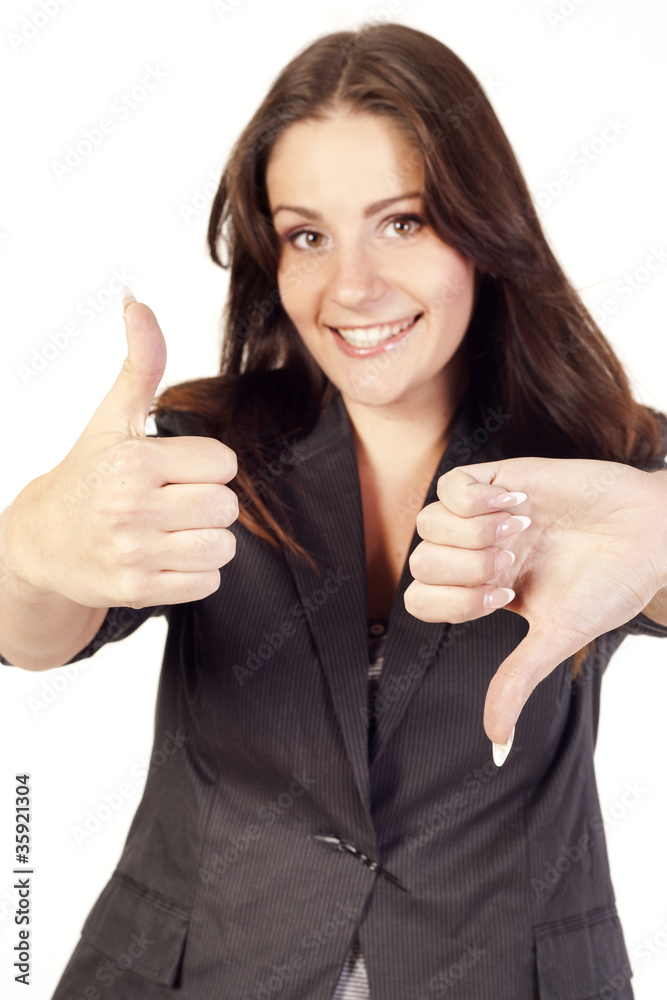 Young smiling businesswoman showing hand ok sign Young smiling businesswoman showing hand ok sign