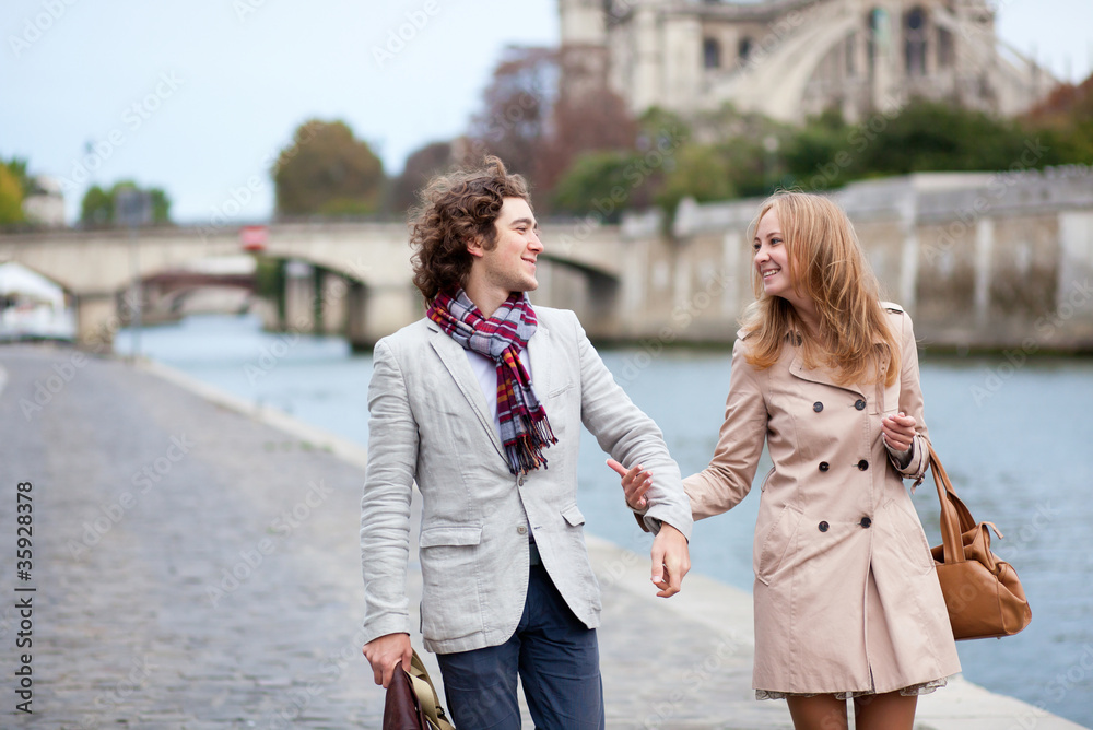 Romantic couple in Paris at the embankment