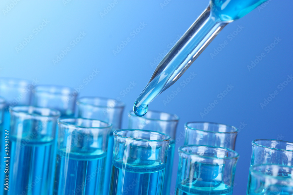 Test-tubes on blue background Test-tubes on blue background